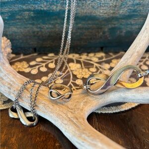 James Avery Silver Infinity Bracelet, necklace, and
Ring ( bundle )
